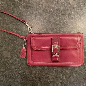 COACH Burgundy wristlet in great pre-loved condition